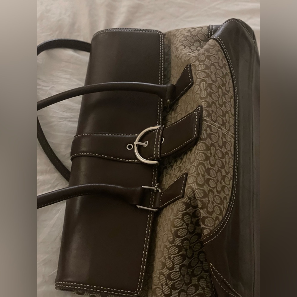 Brown COACH Purse and Wallet.